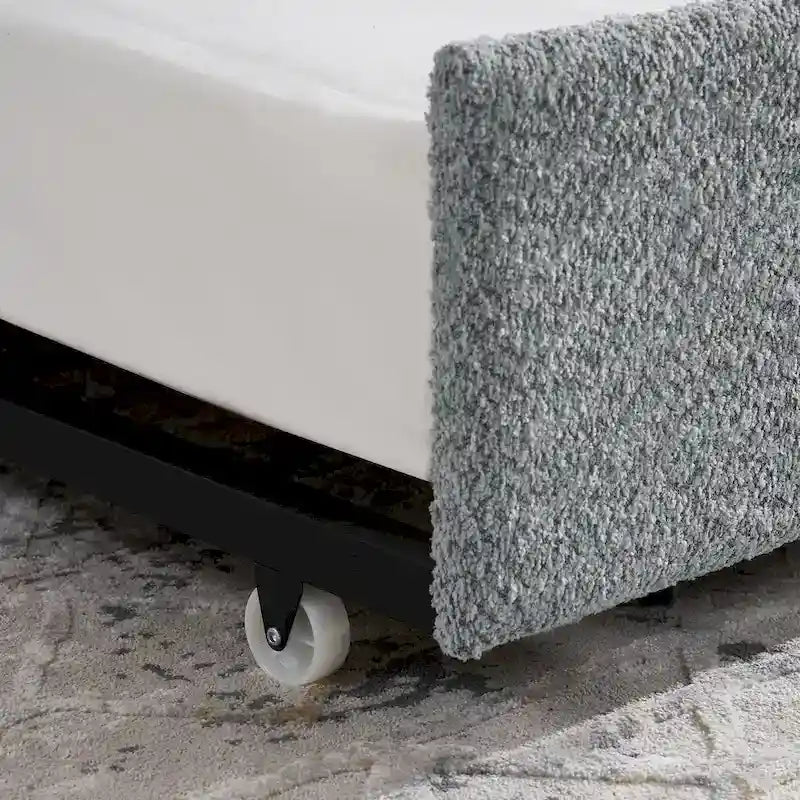 Lit de repos en tissu bouclé gris avec lit gigogne profil bas