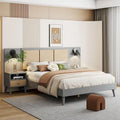 Lit plateforme gris grand format avec tête de lit capitonnée et pieds en bois