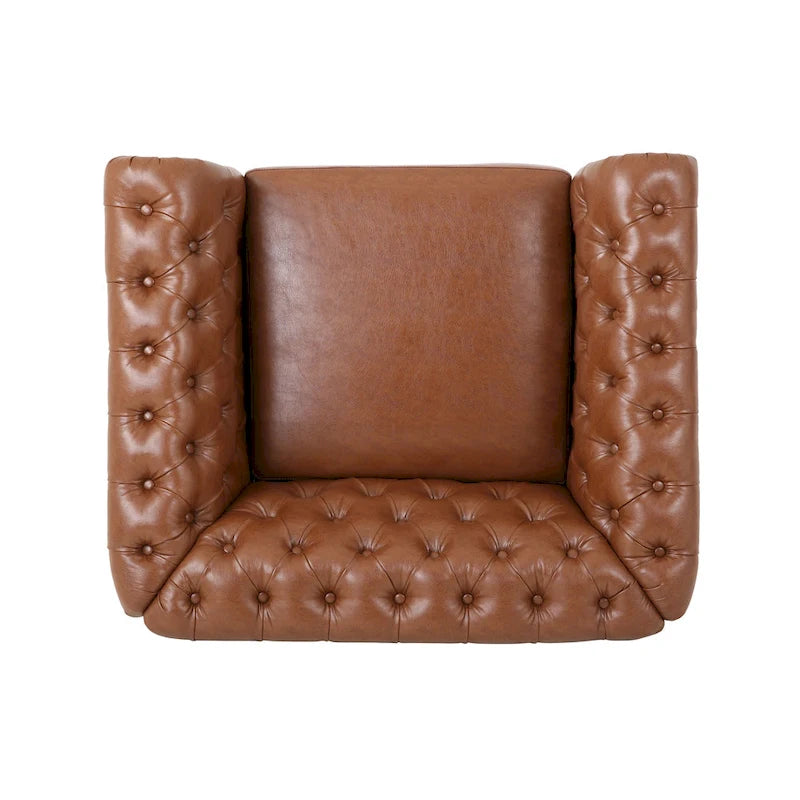 Fauteuil club capitonné en similicuir brun clair avec clous décoratifs et accoudoirs volutes
