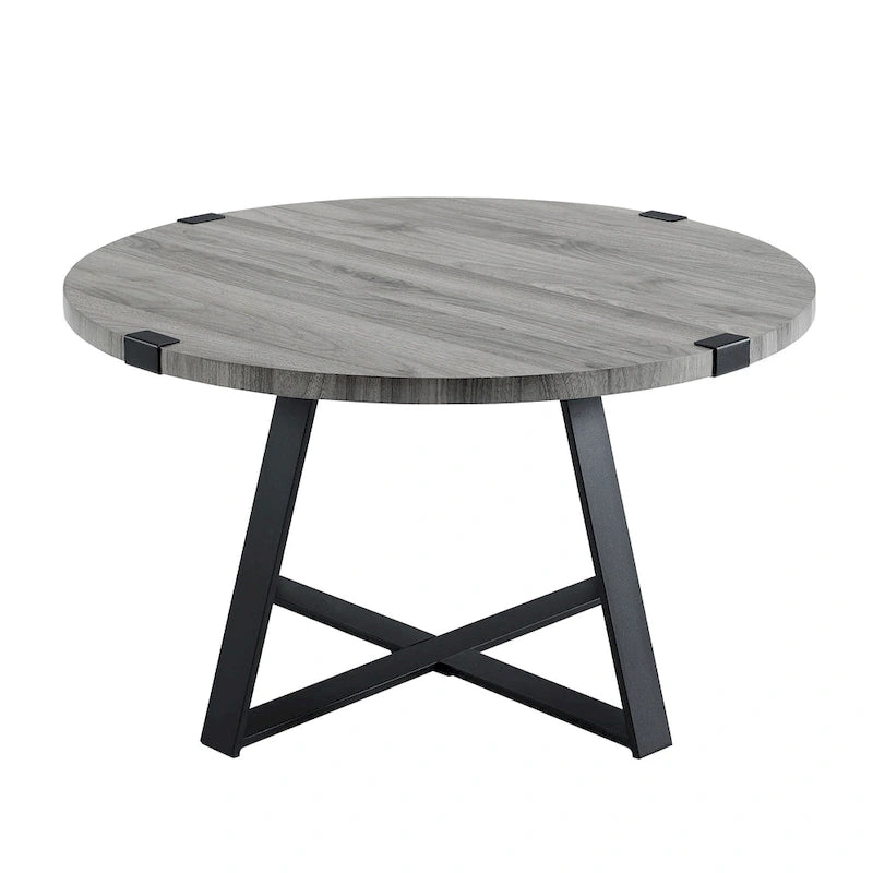Table basse ronde industrielle avec plateau aspect bois et piètement en X en métal