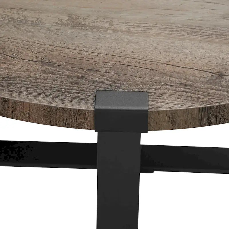 Table basse ronde industrielle avec plateau aspect bois et piètement en X en métal